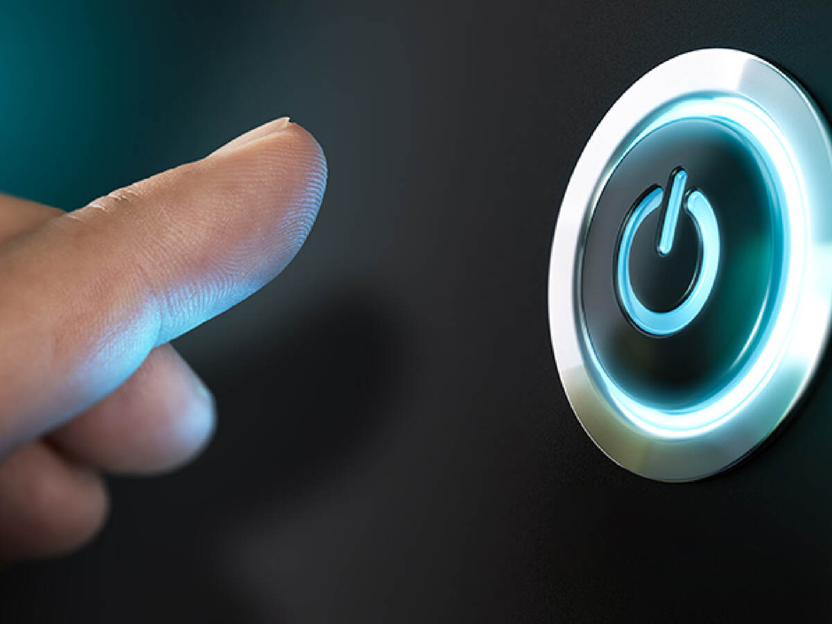 Finger on power button